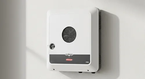 Solar inverter mounted on a clean interior wall in a Mandurah property