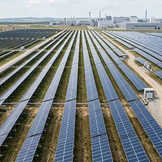 Solar panels arranged on a flat commercial rooftop in Marangaroo