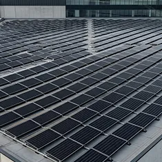 Solar panels arranged on a flat commercial rooftop in Mirrabooka