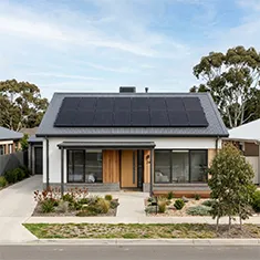 Off-grid solar panels installed on the roof of a simple house near Mirrabooka