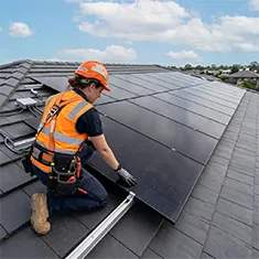 Solar maintenance inspection by a technician on a Mirrabooka rooftop